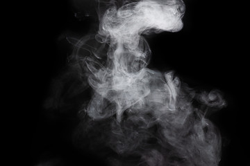 White steam on a black background.