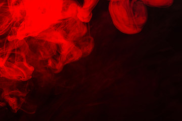 Red steam on a black background.