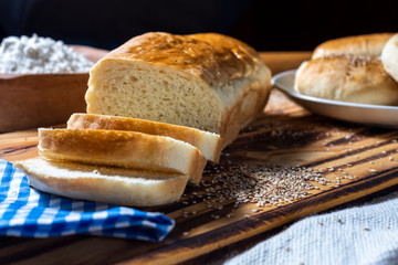 sliced bread on a wooden board