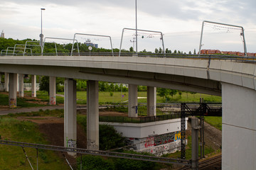 Obraz premium train tracks on the bridge in the city of prague in the czech republic in spring 2020