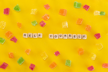 Words help yourself written on a yellow background