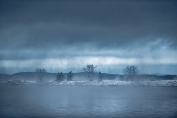 Fototapeta premium In the fog. Fog over Lake Babinskaya Imandra in the Arctic in the north of the Murmansk region