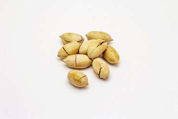 Ripe pecan isolated on white background