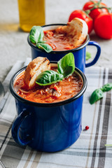 A bowl of chilli with bean and minced meat. Soft focus, shallow depth of field.