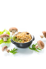 vegetarian cooked rice with mushrooms in a ceramic bowl