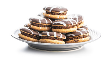 Sweet dessert with chocolate cream and chocolate icing