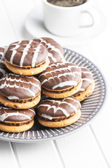 Sweet dessert with chocolate cream and chocolate icing