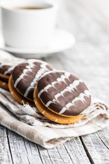 Sweet dessert with chocolate cream and chocolate icing