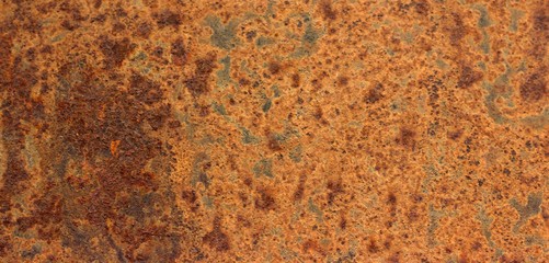 
Brown bubbling rust on an iron sheet. The effects of metal corrosion