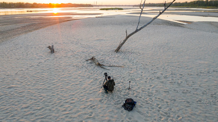 lonely withered tree by the river © Krzysztof