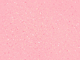 Pastel pink background with small white pink and yellow spots