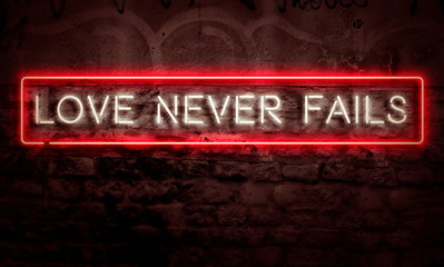 Fototapeta premium Love Never Fails Neon Inspirational Sign