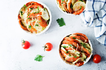 Zucchini tomato casserole with pepper and parsley