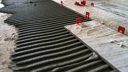 Laying tiles in the bathroom or kitchen