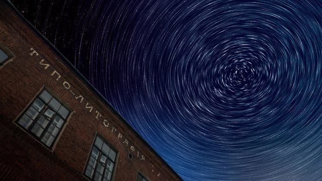 Typolitography, Night stars timelapse with long circle trails, red brick old typography