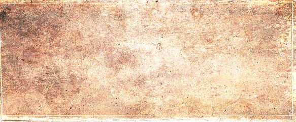 Old brown paper parchment background design with distressed vintage stains and ink spatter and white faded shabby center, elegant antique beige color