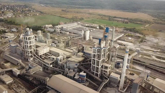 Aerial view of cement plant factory at industrial production area.