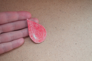World Blood Donor Day. World Hemophilia Day. Hand holds a drop of blood. World Hemophilia Day....