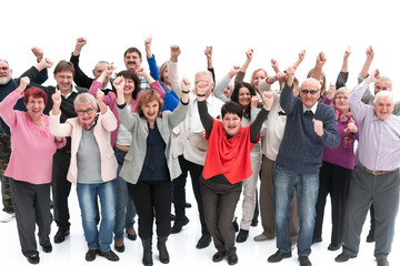 Fototapeta premium Group of senior people raising their hands celebrating a victory