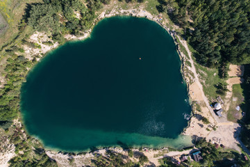 Heart shape lake in Trzebinia Poland aerial drone view