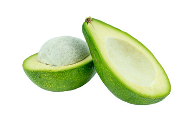 Avocado's and pit seed composition isolated over the white background. Avocado on white