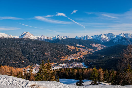 Winter landscape with a village Padola in the Dolomite mountains of the Alps, Comelico, Italy, January 2020