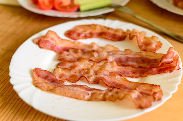 Freshly baked bacon on a blurred background