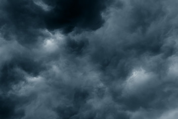 Stormy rain big fluffy clouds. Dark sky. Natural scenic abstract background. Weather changes backdrop. Sky filled with voluminous clouds.
