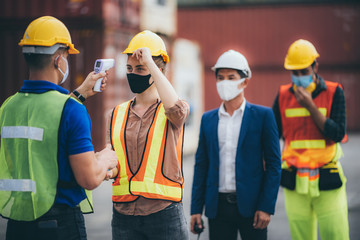 Staff are checking fever for workers, engineers and foreman. In the storage area that prepares international shipping