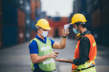 Staff are checking fever for workers, engineers and foreman. In the storage area that prepares international shipping