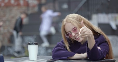 woman drinkking with coffee