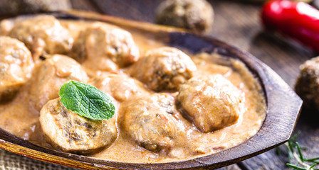 Vegetarian meatballs with white sauce of herbs and chopped vegetables. Meatless vegan food with organic products.