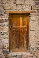 old wooden door in wall