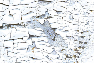 cracked old white paint on the wood surface