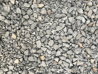 Gray gravel pebble small stones texture background decorative