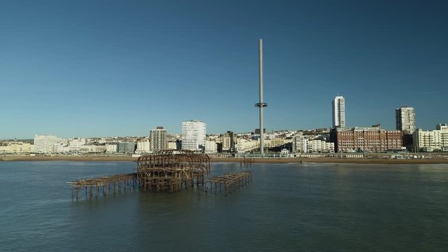View from Brighton West Pier looking toward British Airways i360 viewing tower as pod descends