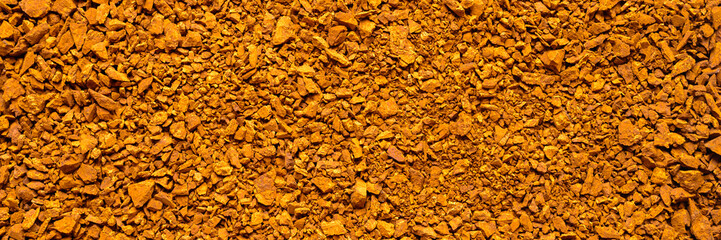 chaga mushroom. background of small broken pieces of birch  fungus chaga. banner
