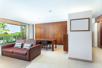 Modern furnished living room, hall with integrated kitchen, corridor, terrace, overlooking the...