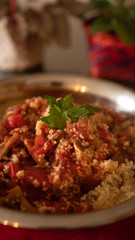 couscous, with tomato sauce, mushrooms and parsley