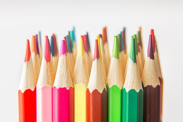 Fototapeta premium Colorful wooden pencils isolated on white background.Close up