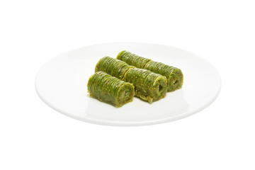 Sarma, fistik sarma. Tukish sweet with pistachio, turkish dessert. 