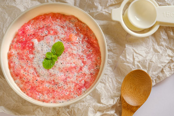 A bowl of sweet red sago in coconut cream.Asian desserts concept