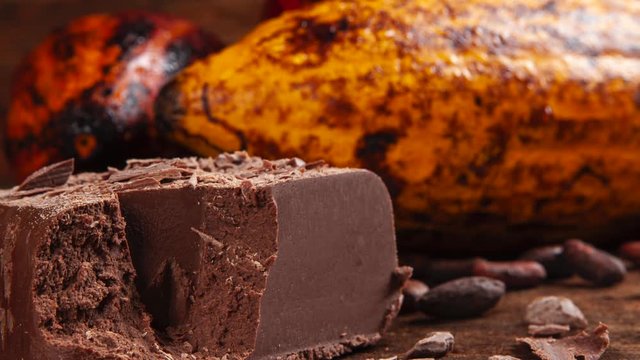 Fruit cocoa with chocolate pieces on a wooden table