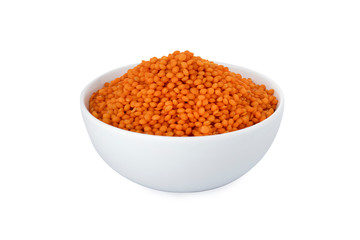 Lentils, red lentils in white bowl, on white background (Tr- mercimek)
