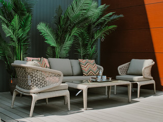 Outdoor patio with comfortable pillow on sofa decoration 