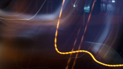 Light trails from panning on the streets at night.