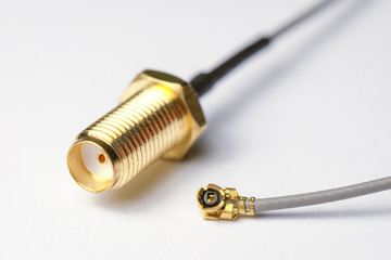 High-frequency ipx to sma female cable connector with gold plated pins. Coaxial cable with connectors  for  special telecommunication equipment.