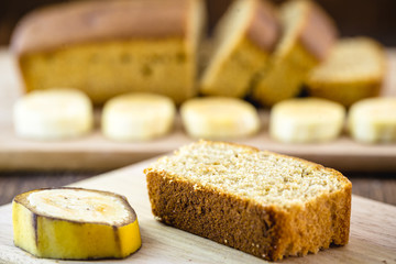slice of vegan bread, vegan meal, natural and organic juices with vegetarian banana bread. Healthy breakfast.