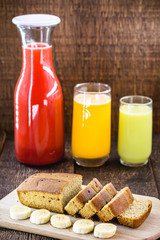 vegan meal, natural and organic juices with vegan banana bread. Vegetarian breakfast.