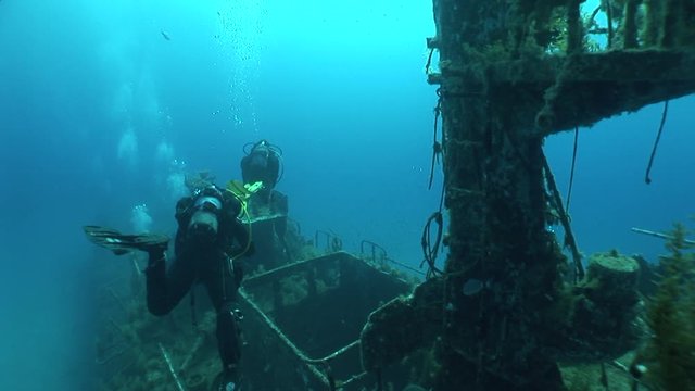 ship wreck scenery underwater shipwreck metal on the ocean floor with fish around the wreck
